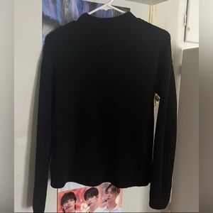 Black turtle neck sweater
